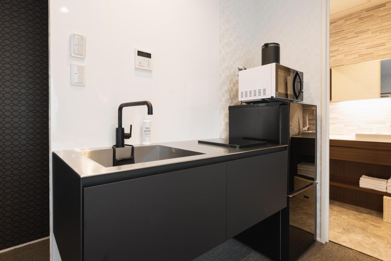 Grand Base Nagasaki Ekimae Aparthotel Екстериор снимка