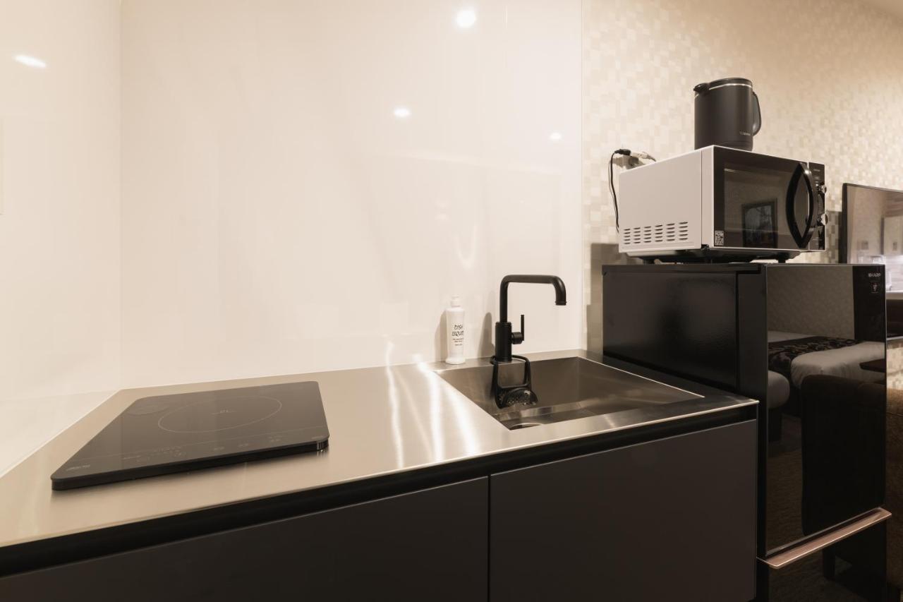 Grand Base Nagasaki Ekimae Aparthotel Екстериор снимка