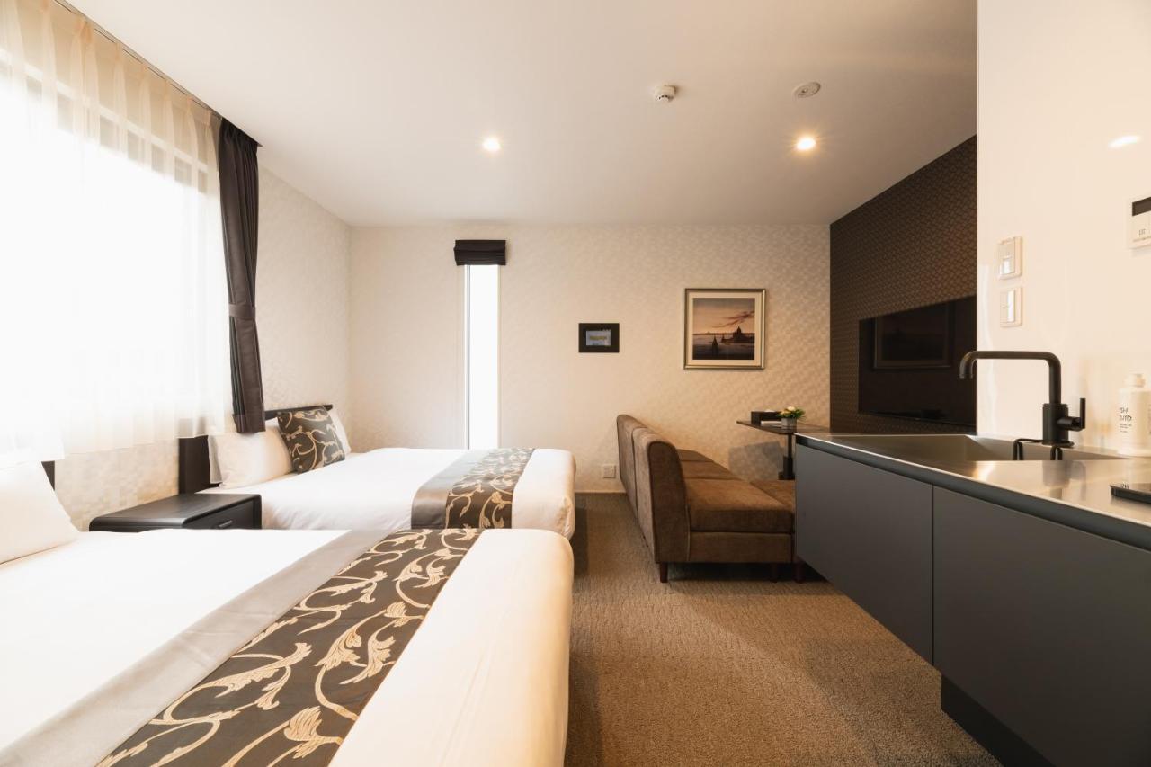 Grand Base Nagasaki Ekimae Aparthotel Екстериор снимка